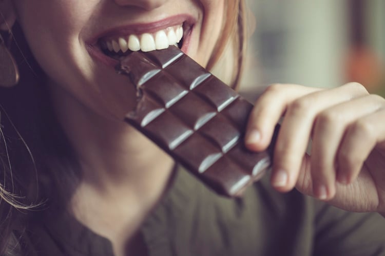 Girl eating chocolate