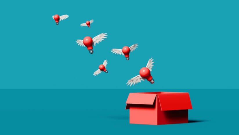 Image of lightbulbs with wings flying out of a box