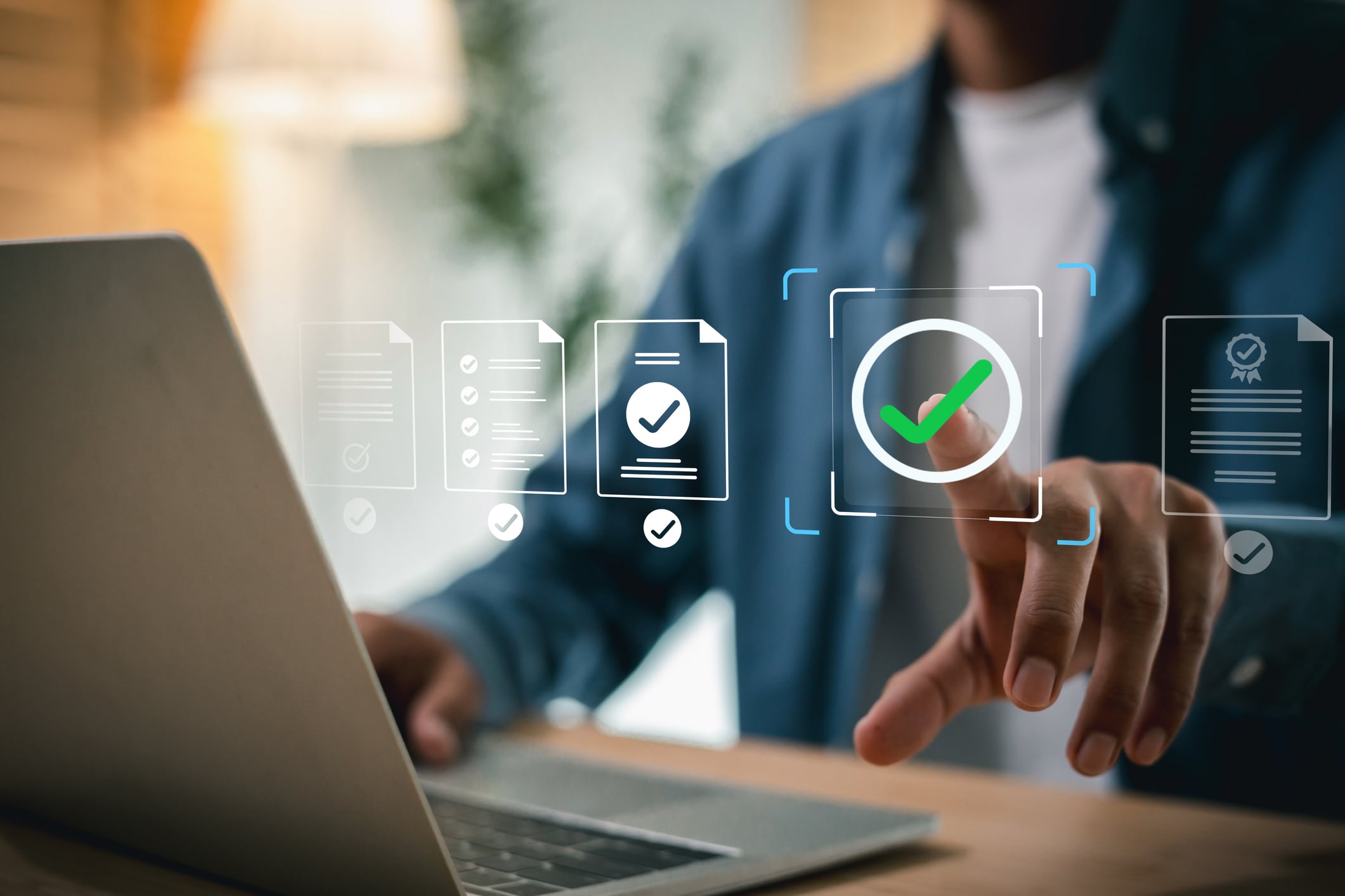 Digital Document Management, Approval and Quality Assurance Concept. Man approval on a digital document workflow projected above a laptop, symbolizing successful business compliance