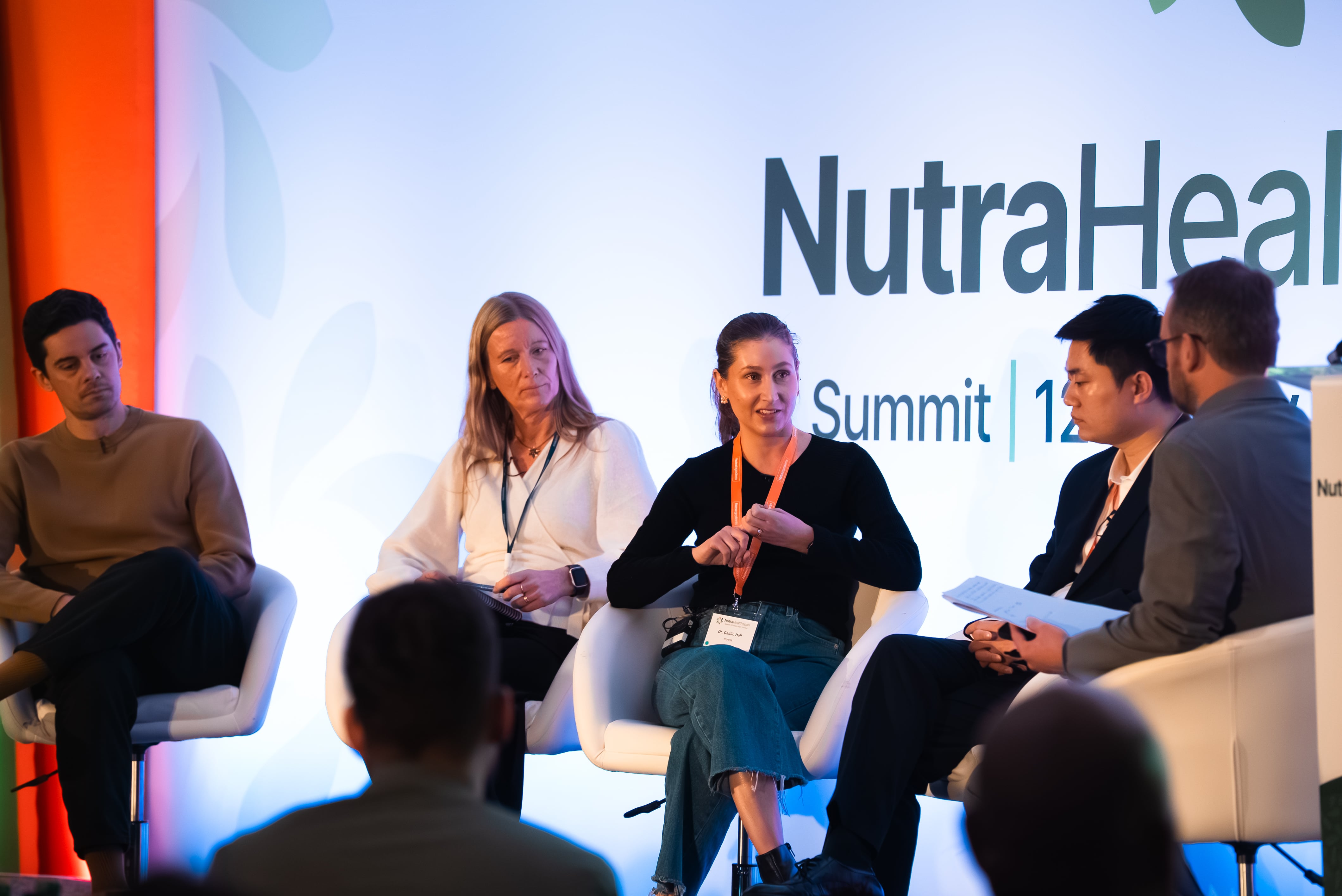 Dr. Catlin Hall speaking during a panel discussion at the Nutra Healthspan Summit