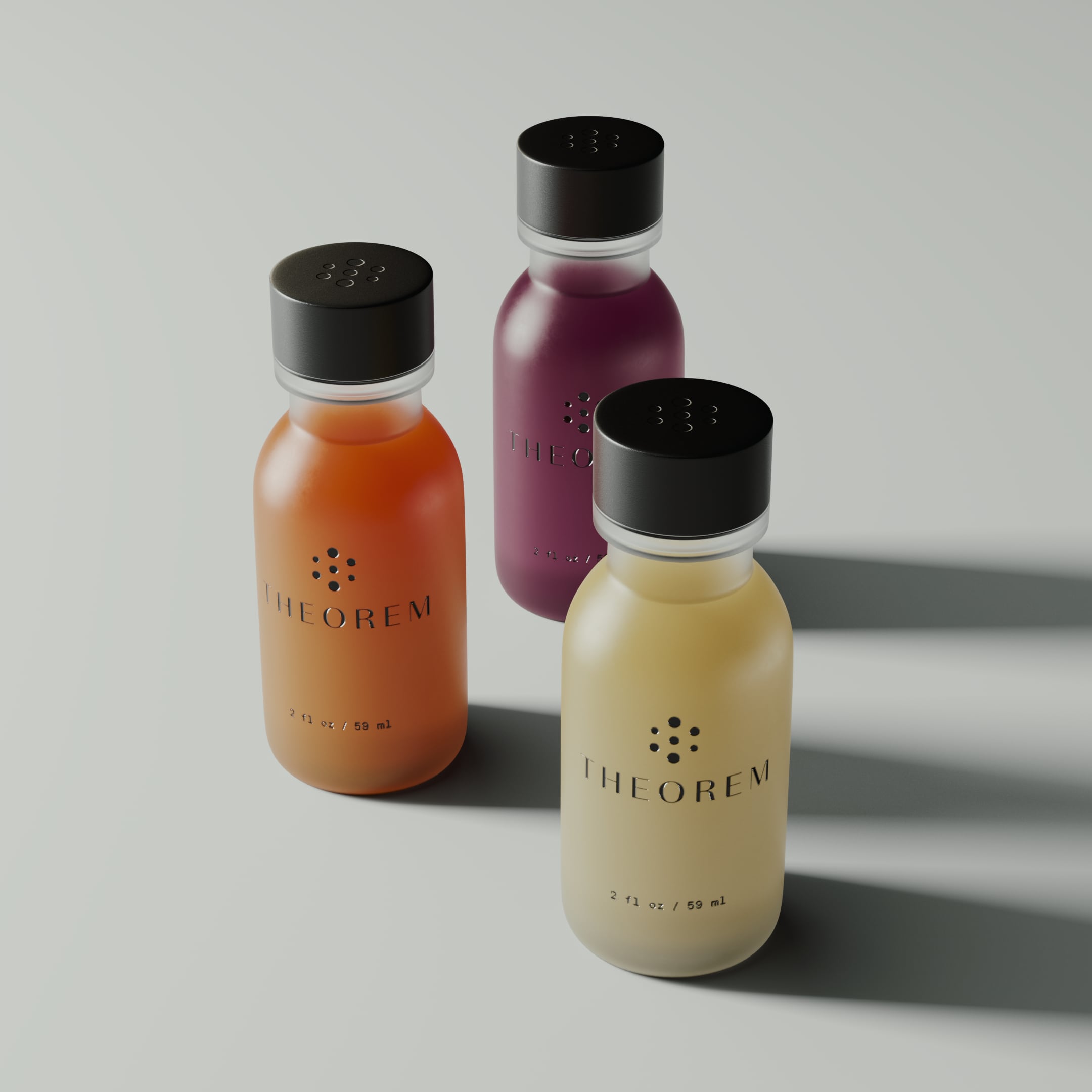 Photo of three minimalist 2 oz-wellness shots in orange, yellow and purple
