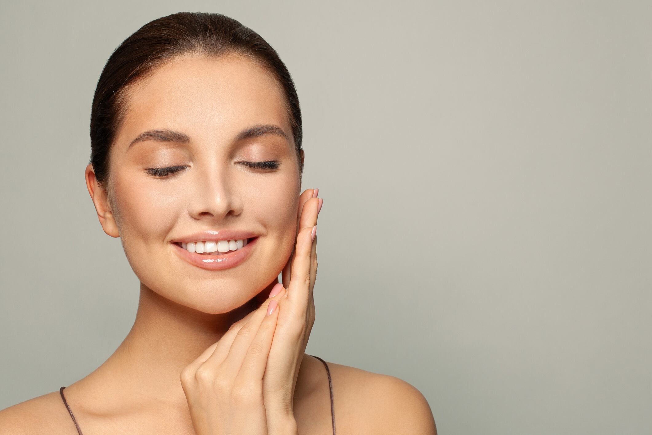 Fresh woman face with clear healthy skin, skincare concept