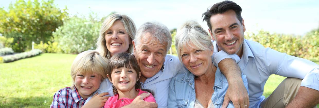 Family sitting in park
