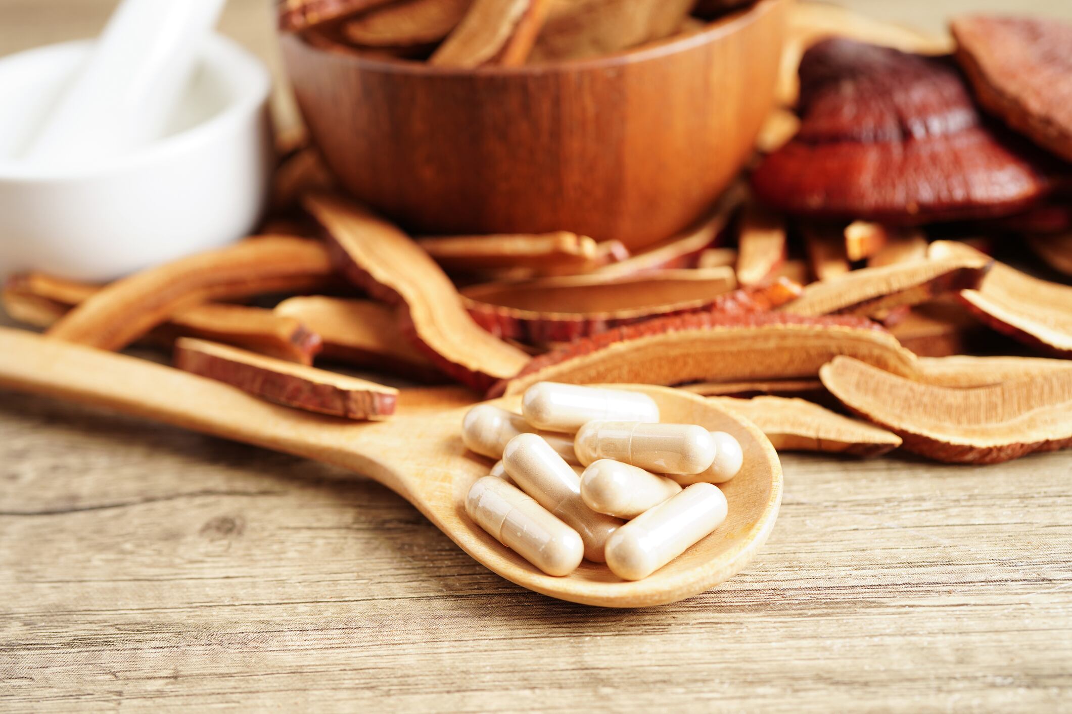 Lingzhi or Reishi mushroom with capsules, organic natural healthy food.