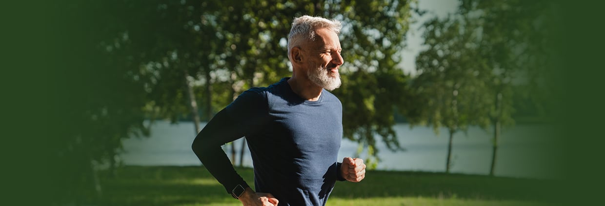 Man running through park