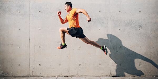 Man exercising jumping through the air