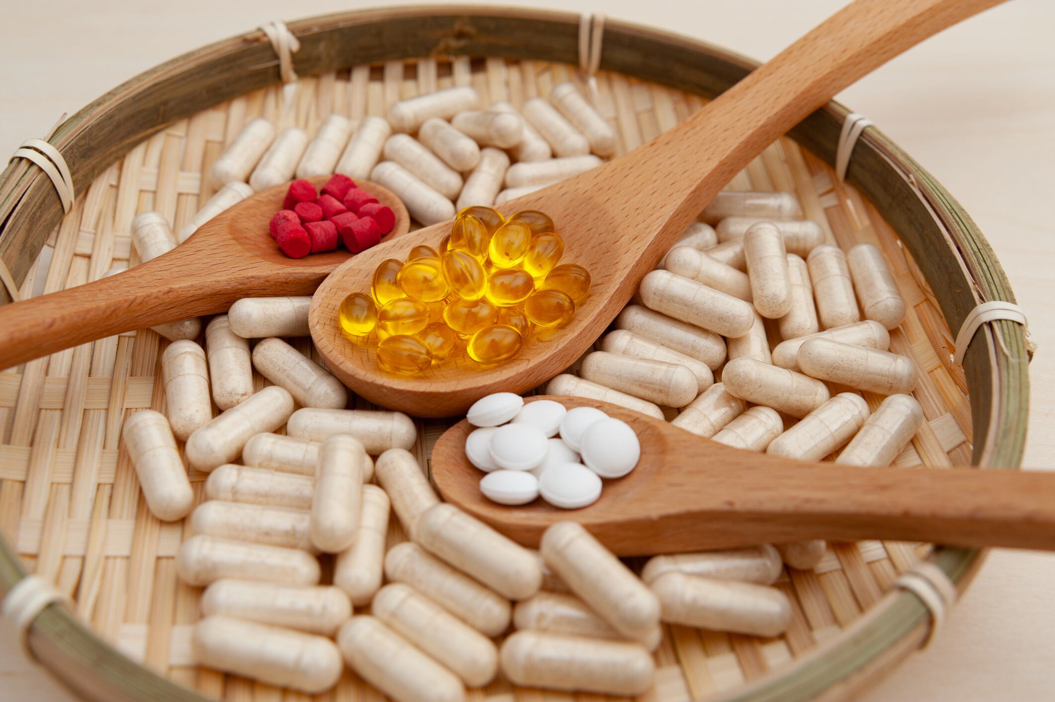 Pills on spoons.