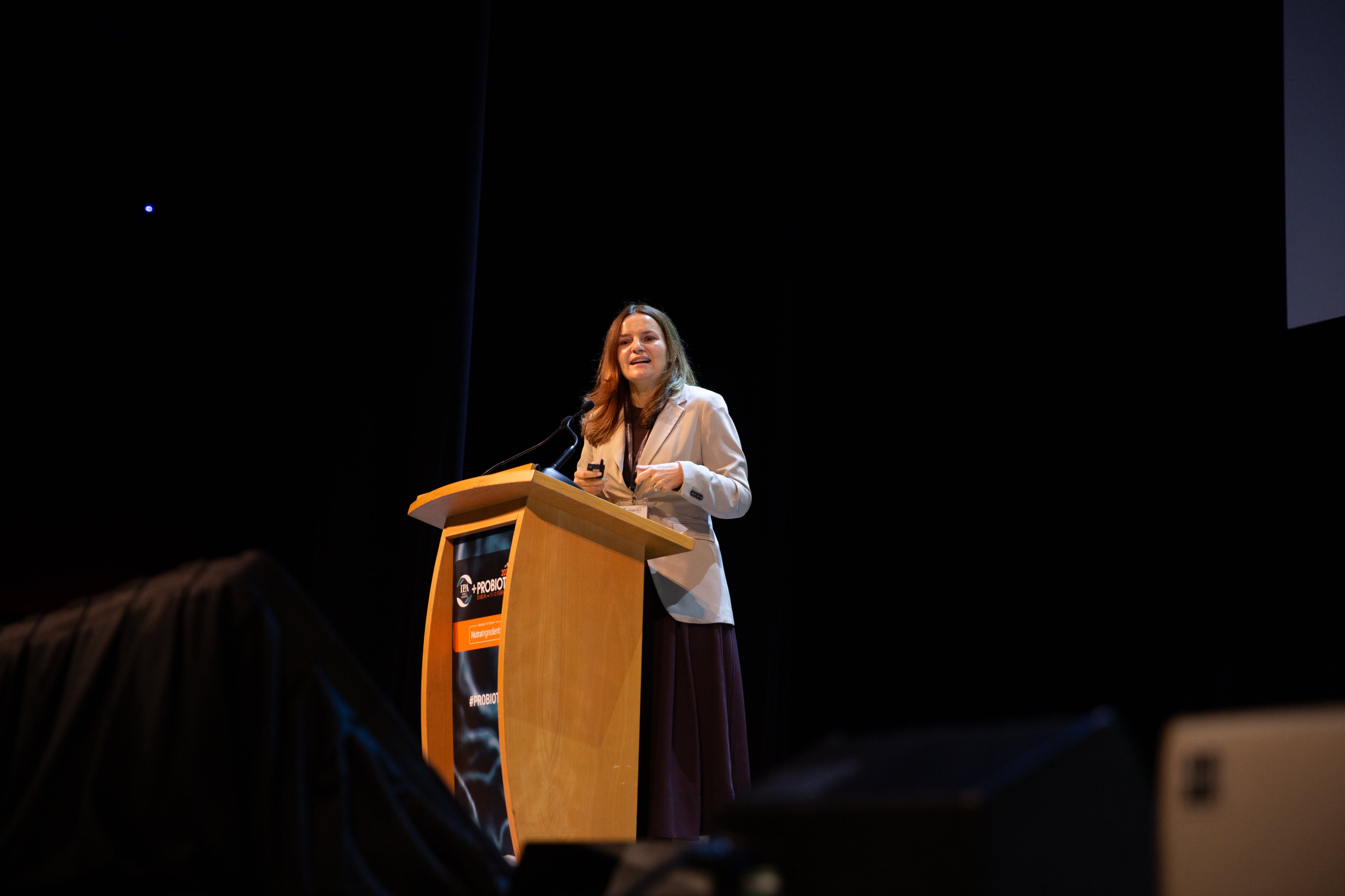 Ewa Hudson, director of insights at Lumina Intelligence, speaking at the IPA World Congress + Probiota 2026, Dublin.
