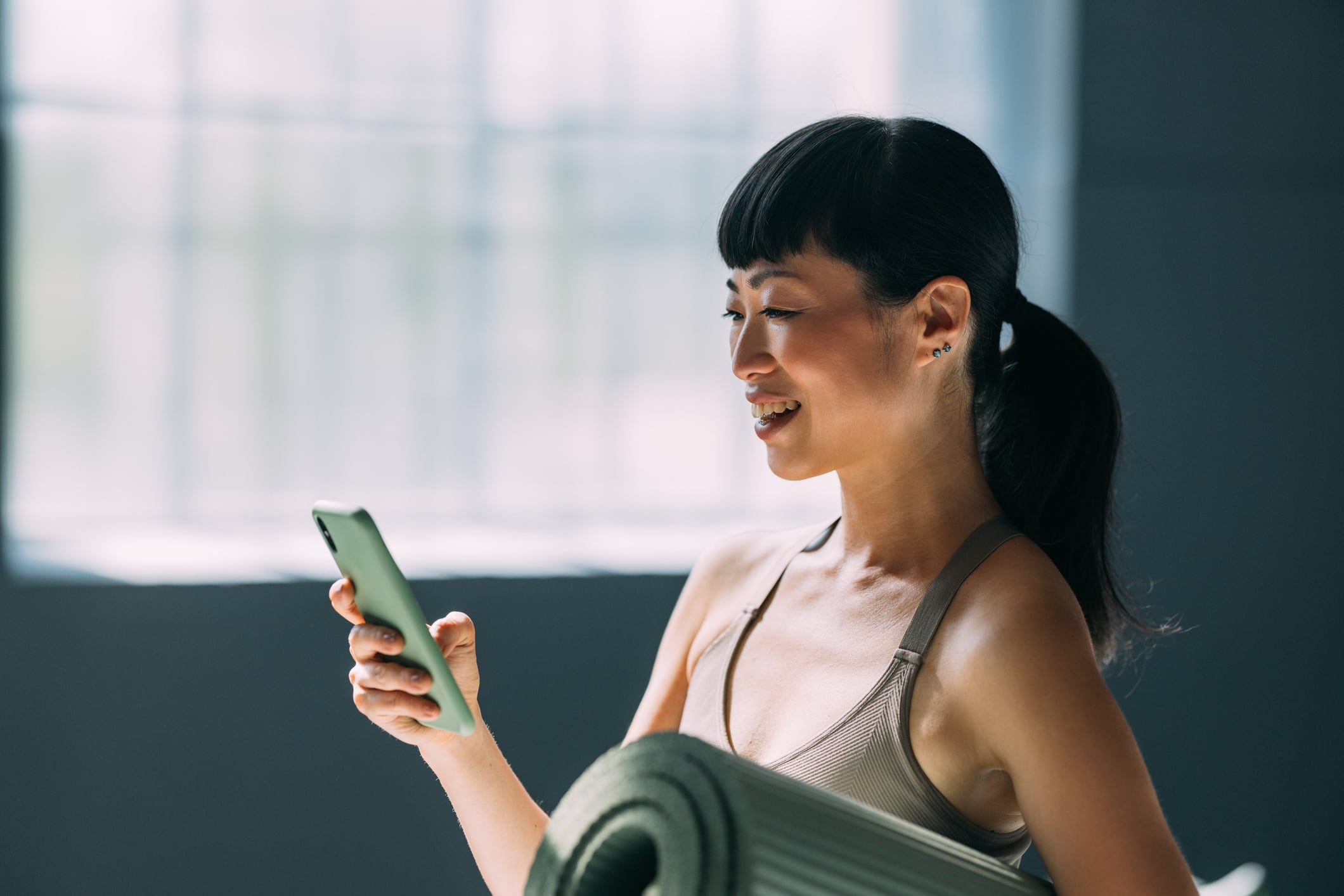 A woman getting ready for her fitness class.