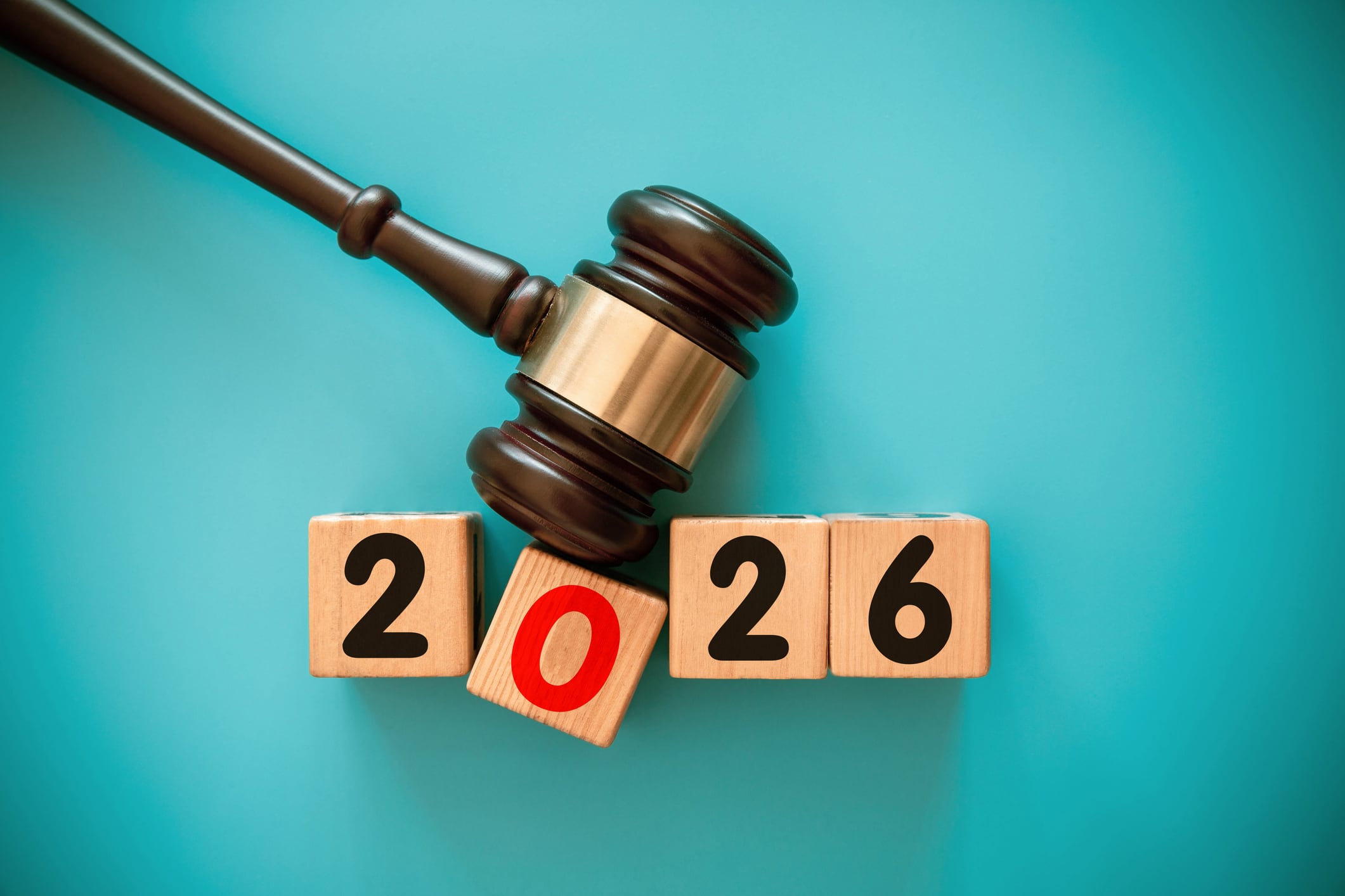 New year 2026 block and gavel on blue background