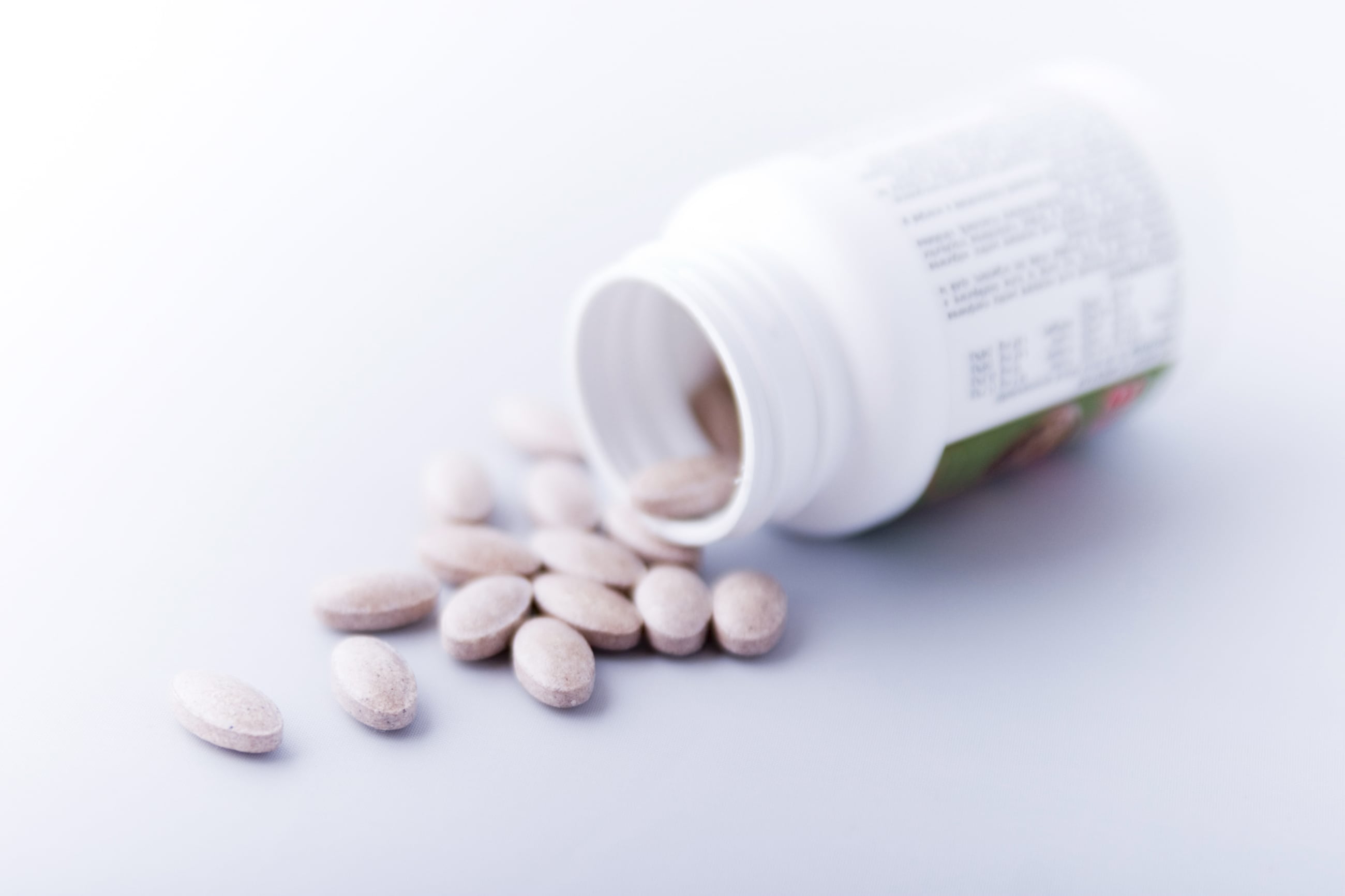 A photo showing a bottle of a health supplement.
