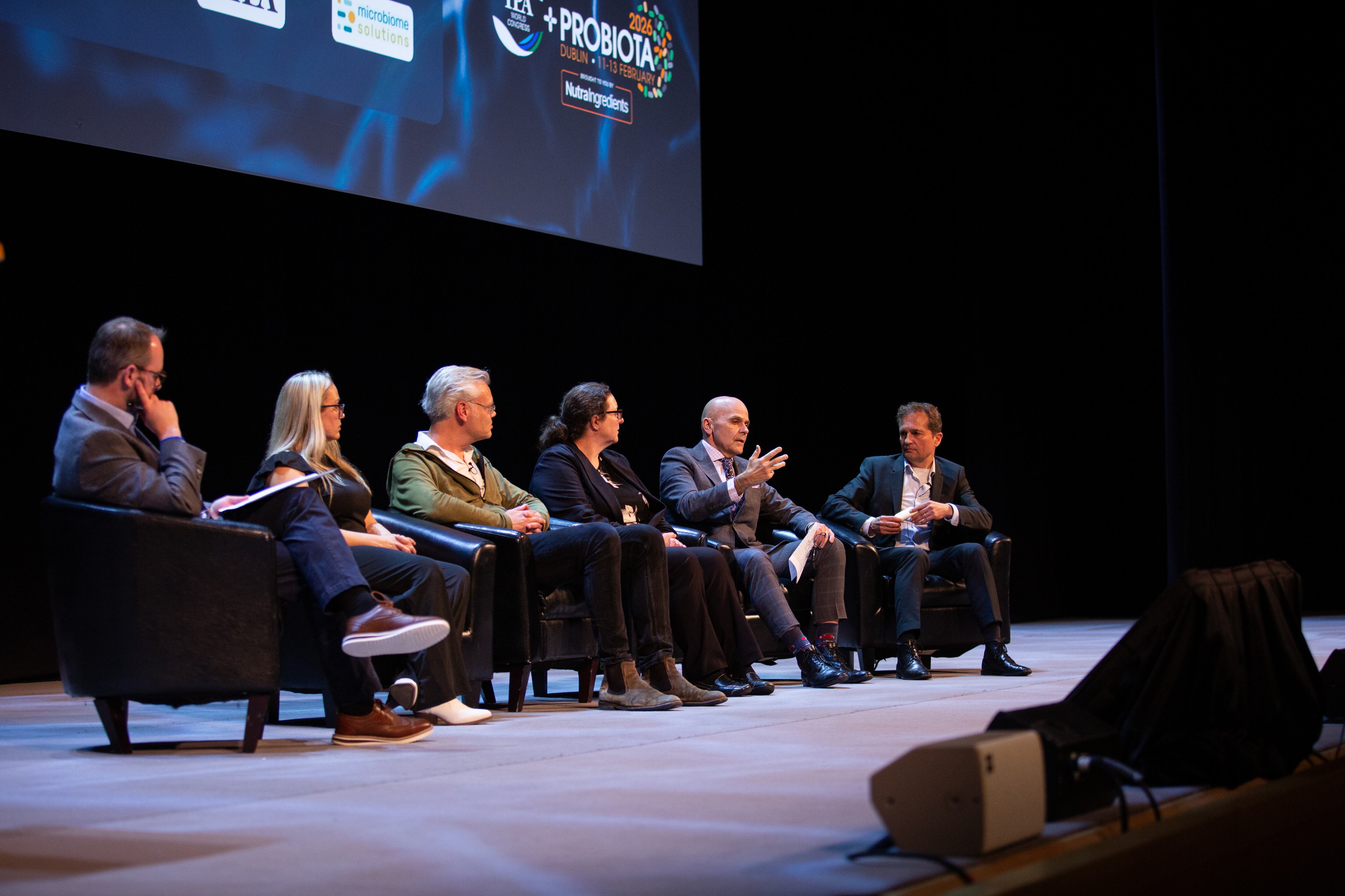 (Left to right): During a panel discussion on strain optimization, Chair Stephen Daniells spoke with Sara Dick of Synbiotic Health, Prof. Remco Kort of VU University Amsterdam, Dr. Sarah O'Flaherty of North Carolina State University, George Paraskevakos of the IPA, and Dr. Wilbert Sybesma of Microbiome Solutions.