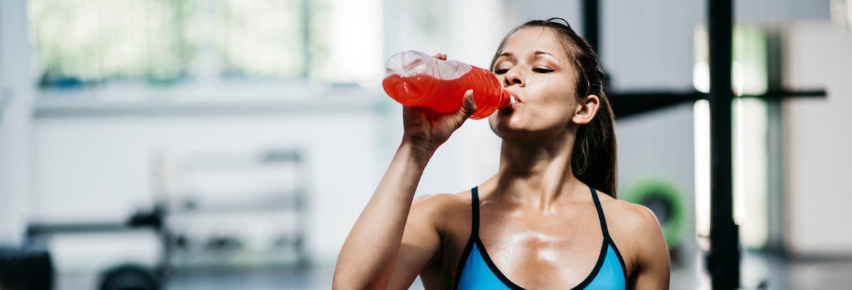 Woman drinking sports drink