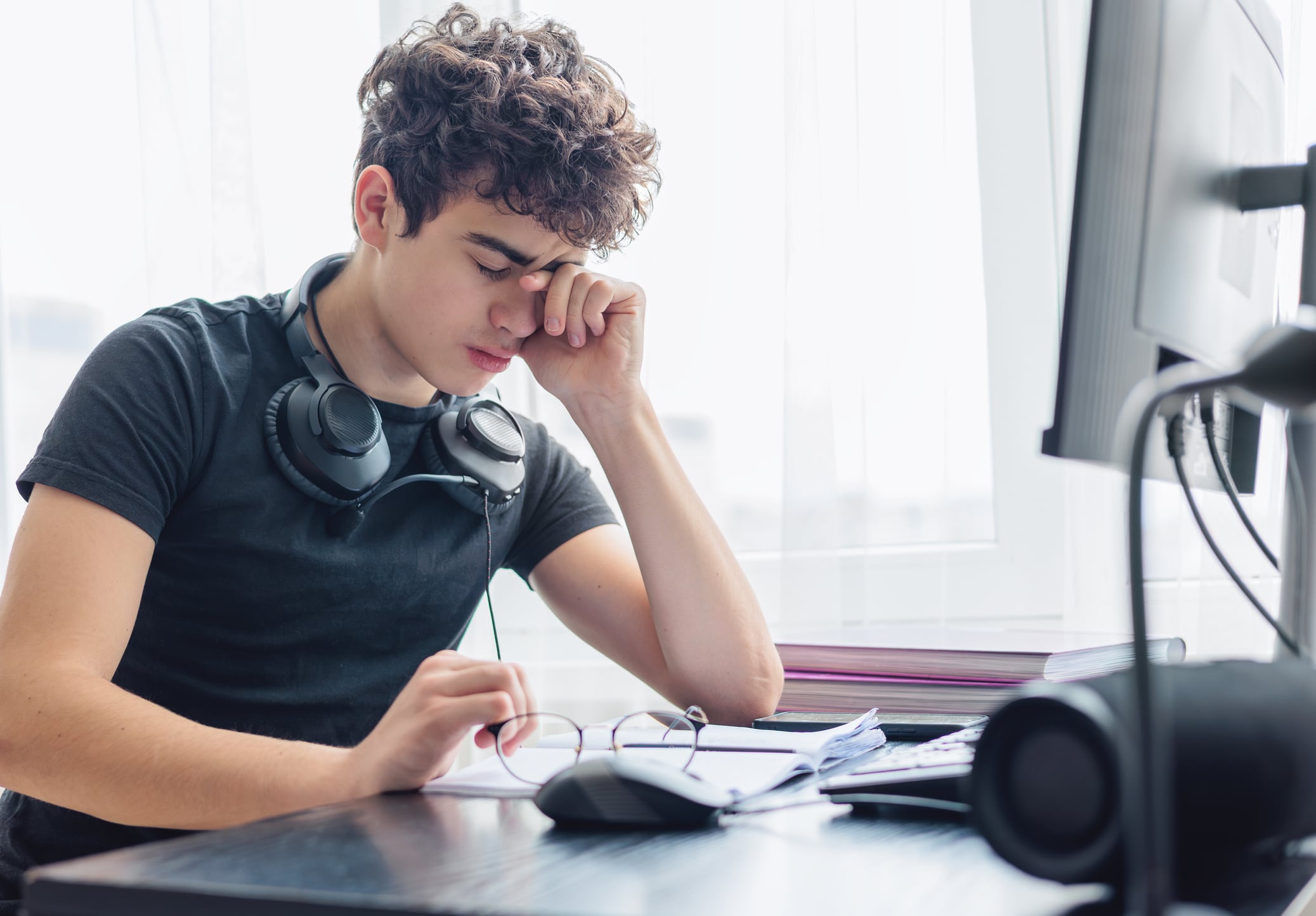 Stressed Out Student. Study Burnout. Overwhelmed. Anxiety. Mental Fatigue. online learning. Overwhelmed Teenager Struggling with Studying and Exam Stress. Learning Difficulties, ADHD, Autism. Copyspace
