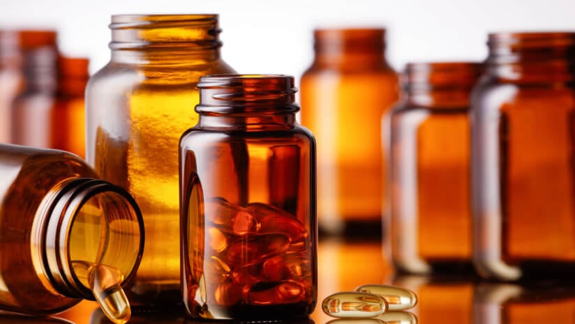 Omega-3s and clear vitamin bottles