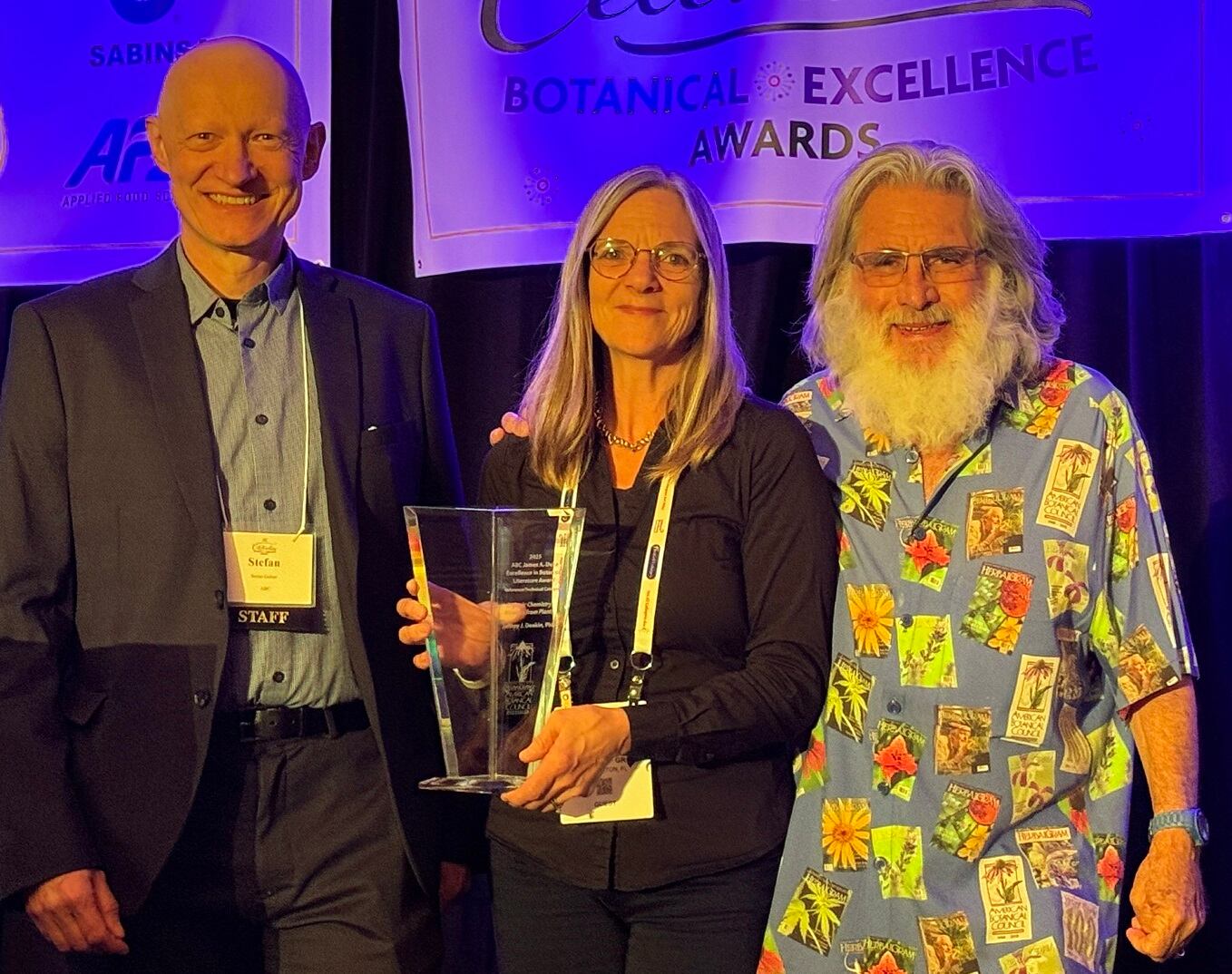 Hilary Lafoe from Taylor and Francis, publisher of Organic Chemistry: Miracles from Plants, accepting the James A. Duke Excellence in Botanical Literature Award (reference/technical category) on behalf of Jeffrey J. Deakin, PhD.