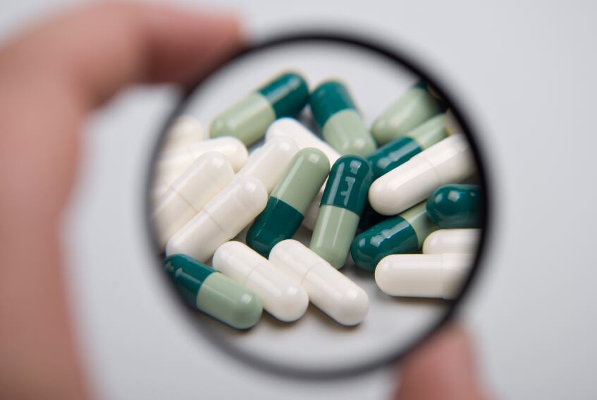 magnifying-glass-supplements-pills-ingredients-iStock.com-Zardinax.jpg