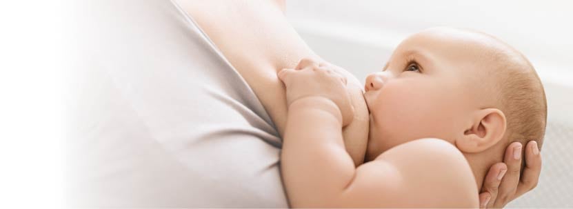 Woman breastfeeding baby