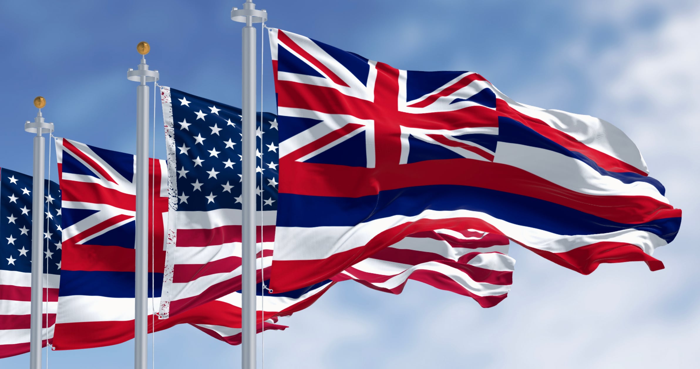 Hawaii state flags waving with the national flags of the United States of America on a clear day. 3d illustration render. Fluttering fabric. Selective focus