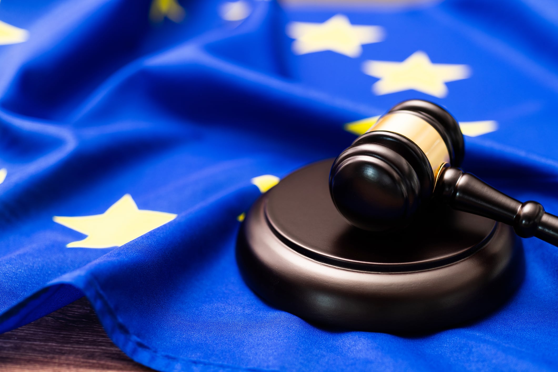 Wooden gavel on European Union flag.
