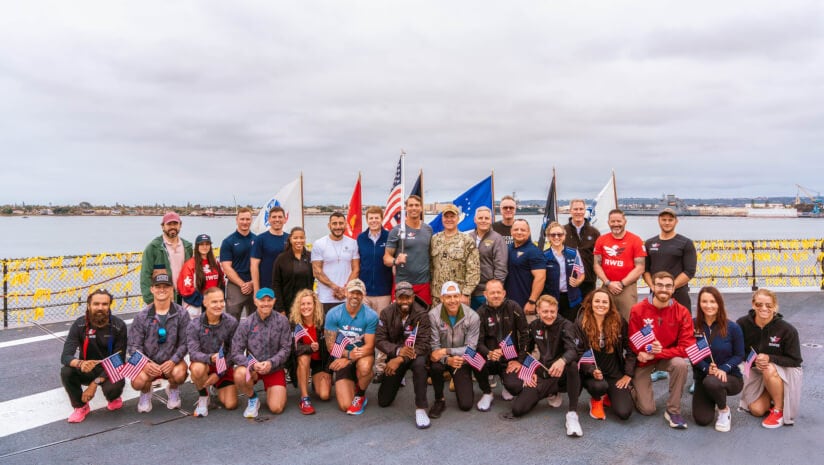 Group photo on the deck of the USS Midway Museum ahead of the Old Glory Ultra Relay