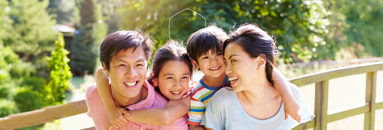 Parents and children laughing together