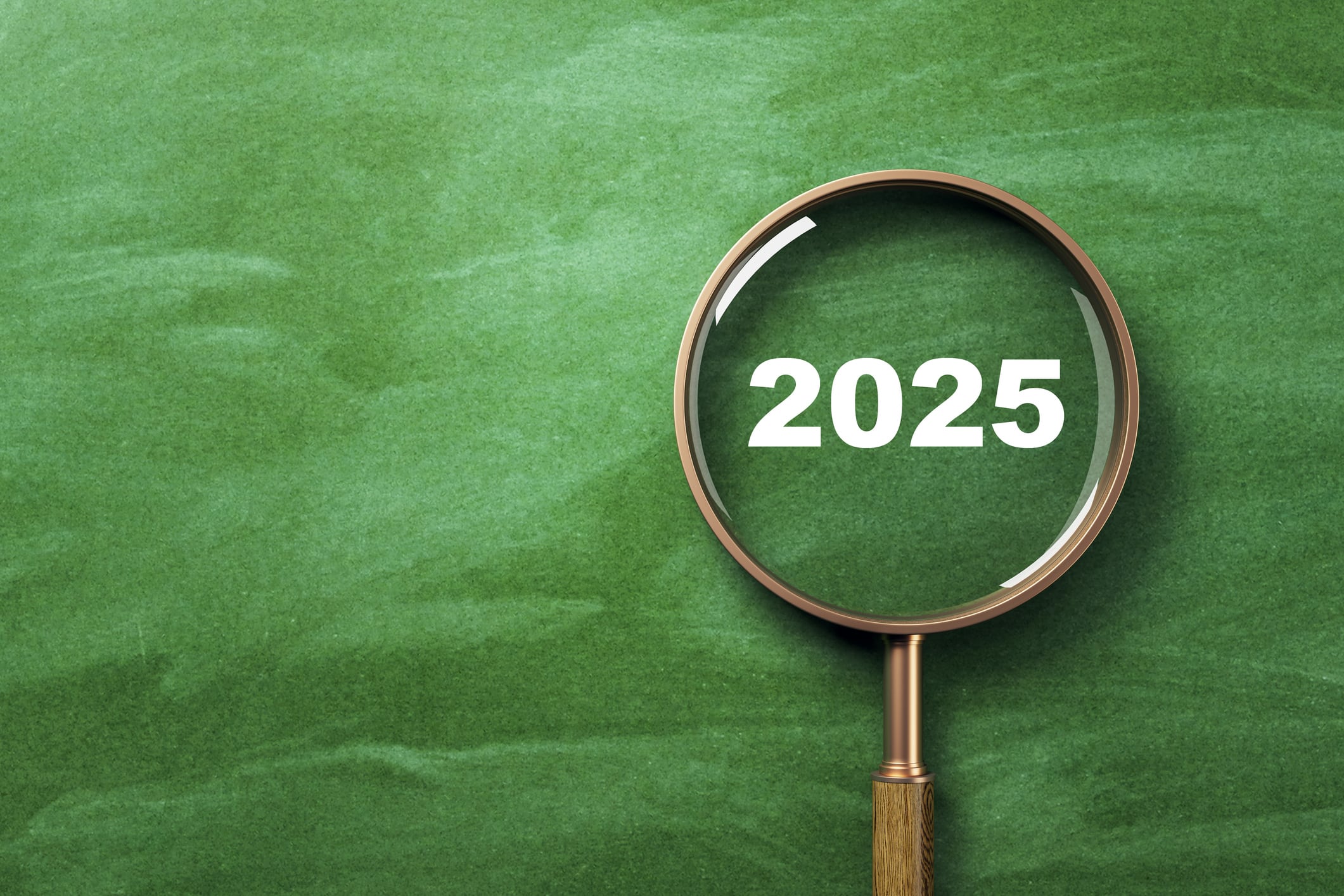 Magnifying glass showing 2025 on green chalkboard background, clean lighting, education and search concept with copyspace for design. 3D Rendering