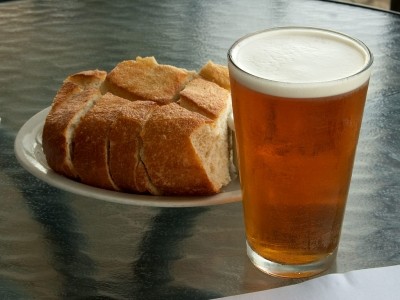 The discovery of gut bacteria that can break down the complex carbohydrates found in yeasts from bread and beer could help the development of new prebiotics, say researchers.