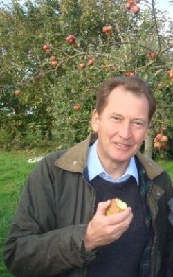 Sir Graham Watson eating an apple